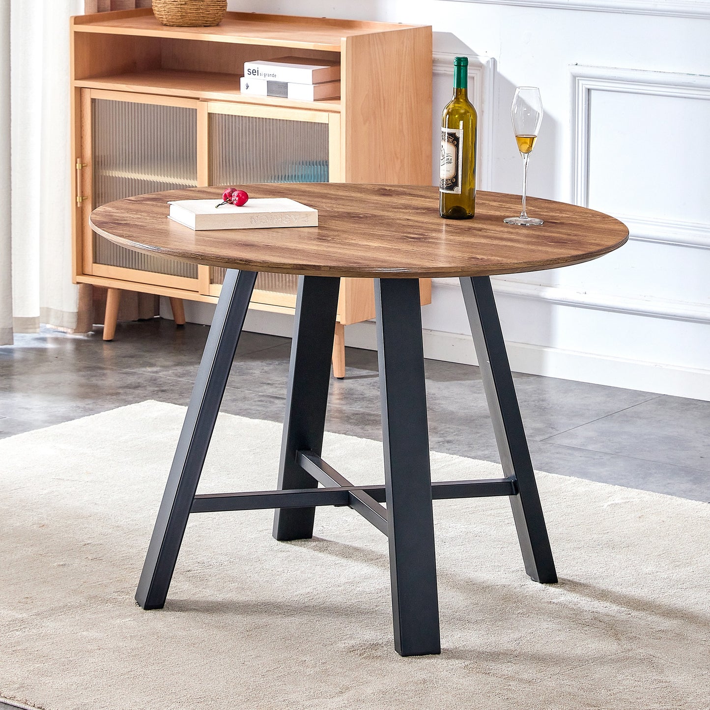 A modern and minimalist circular wooden dining table , coffee table. 42 inch diameter wood color MDF desktop, black meta